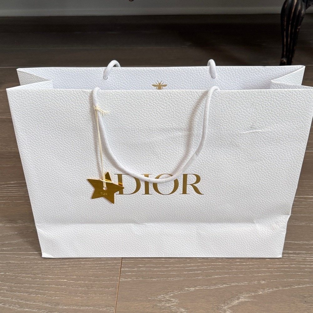 Dior Elegant White Textured Bag with gold star